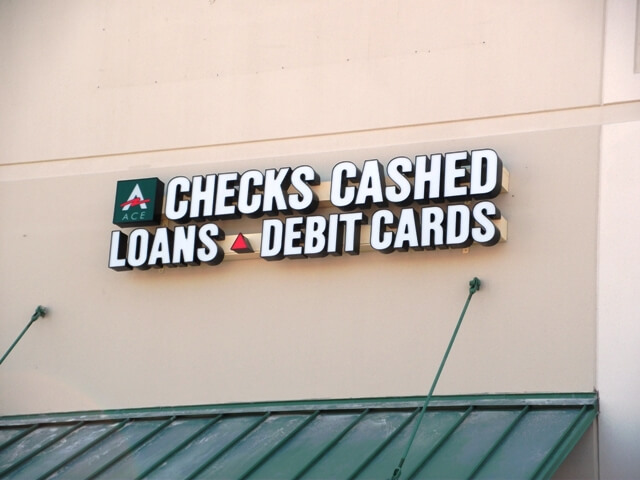 Checks Cashed Loans Debit Cards Sign